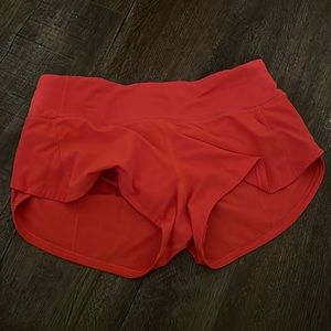 red lululemon shorts size 2 reg